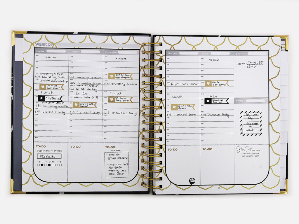 Open planner with weekly schedule and to-do list on a white background