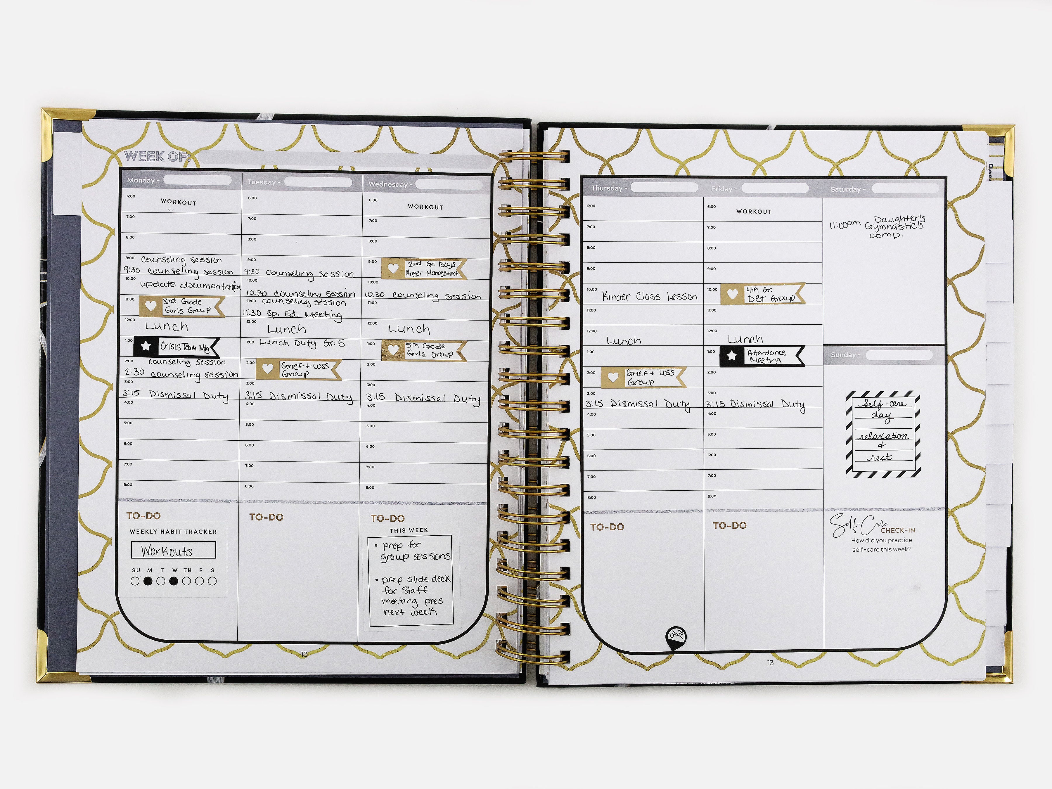 Open planner with weekly schedule and to-do list on a white background