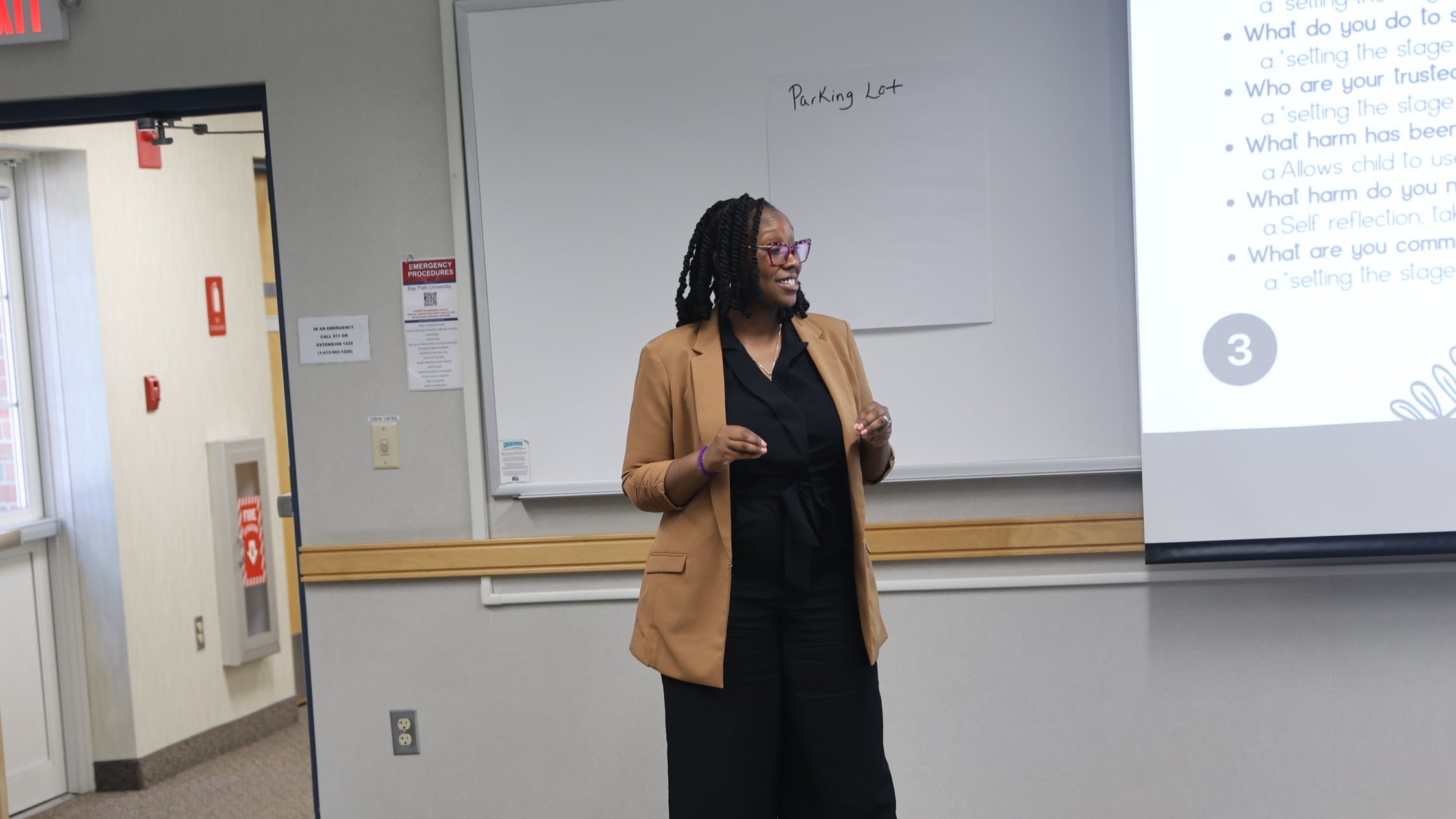 Teacher giving a presentation in a classroom setting